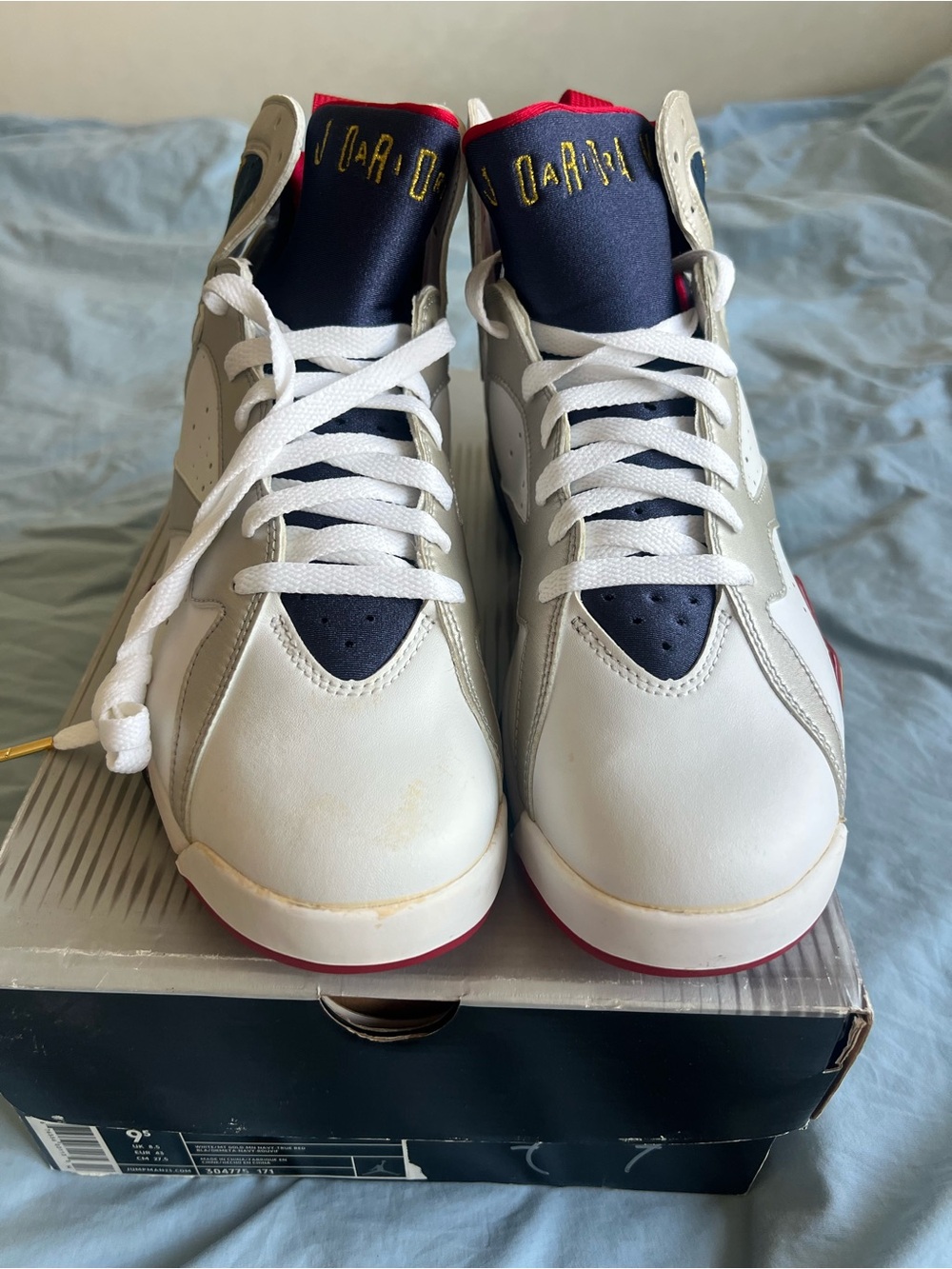 Air Jordan 7 Retro Olympic White Navy Sneakers with Red and Gold Detail